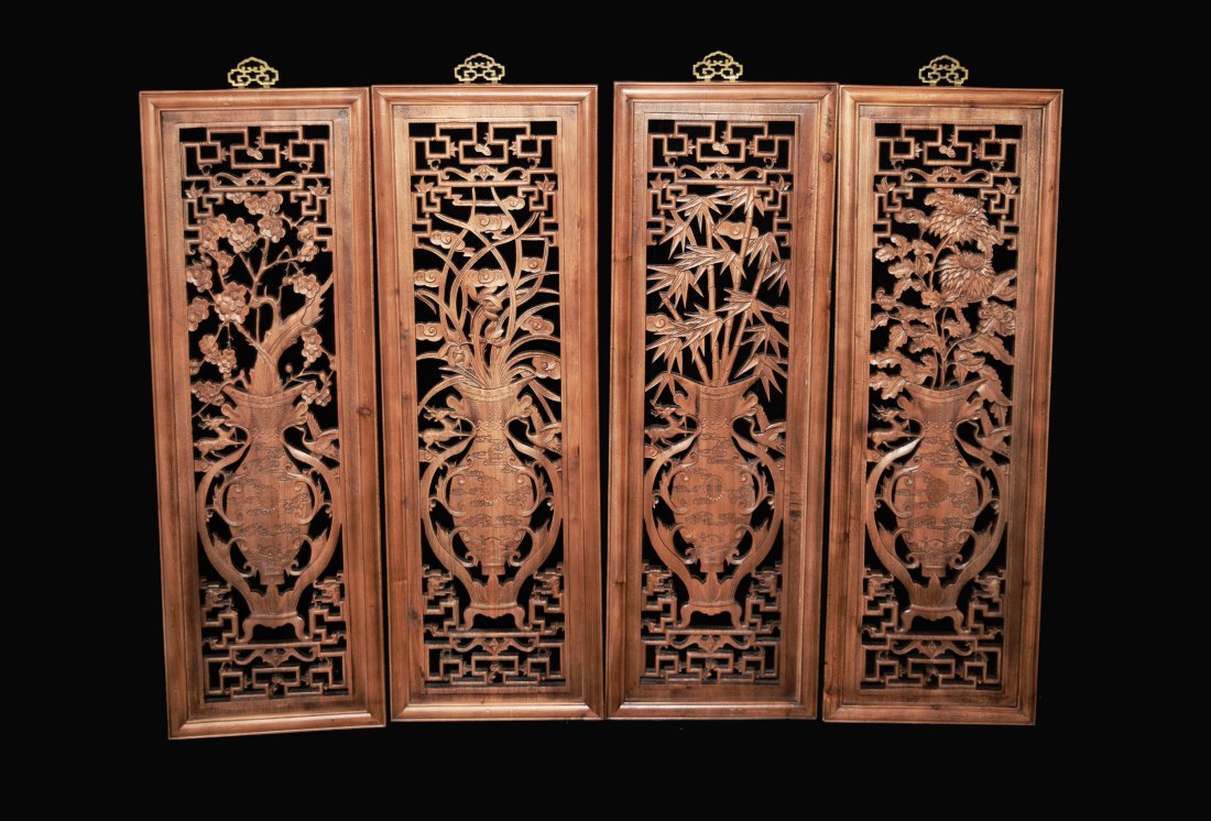 A Set of Four Chinese Camphor Wood Hanging Panels (1 of 3)