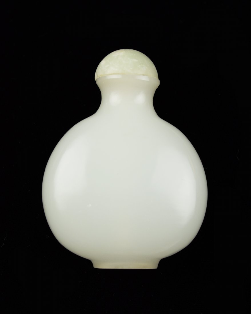 An Old White Jade Plane Snuff Bottle: An Old White Jade Plane Snuff Bottle ｜ 白玉素鼻煙壺 Dimension: 80x60x32mm. Please Read the Terms and Condition Carefully before you place your bid. All expli