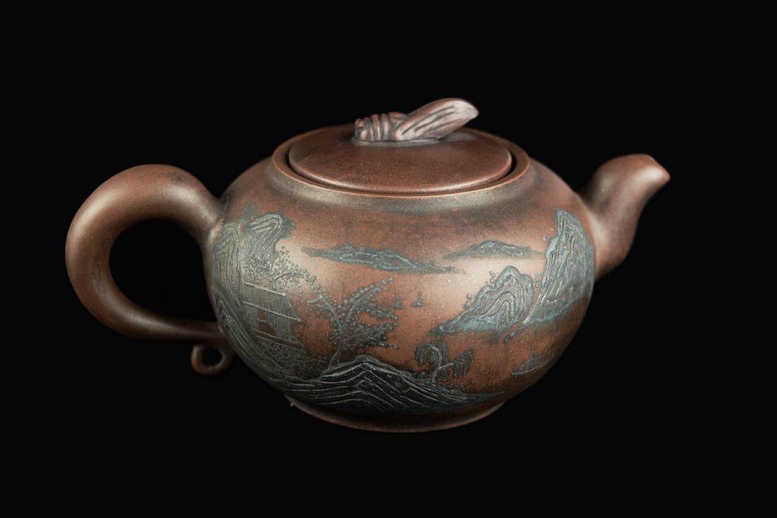 [Chinese] A Yixing Clay Teapot with Landscape Relief,: [Chinese] A Yixing Clay Teapot with Landscape Relief, sealed as "Made by Wang, Huifen" ｜ 『王惠芬』款浮雕山水紫砂壺