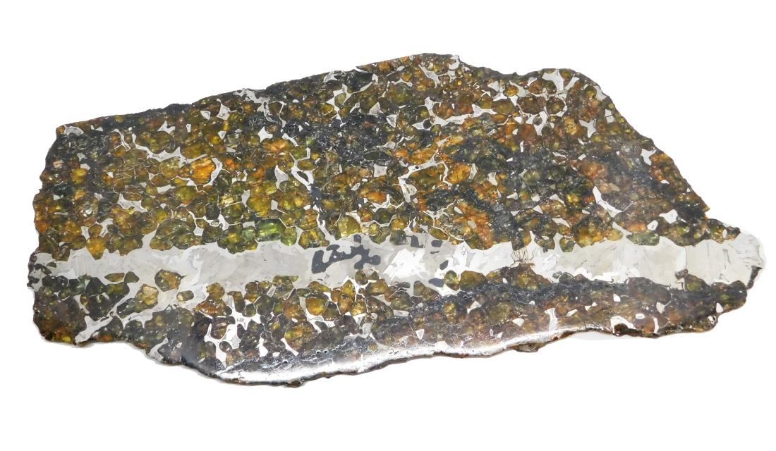 Seymchan Pallasite Meteorite Slice 427 grams: Seymchan pallasite meteorite from Russia. 80% olivine / 20% metal. 427 grams. Nice polished piece with metallic vein. Measures approx. 244mm x 110mm x 5mm. Seymchan was found in 1967. This meteorite c