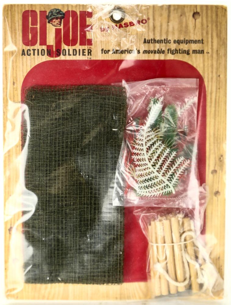 GI Joe Action Marine Paratrooper Camo. Netting Set: GI Joe Action Marine Paratrooper Camouflage Netting Set from 1964. New in package. Some damage to the plastic.