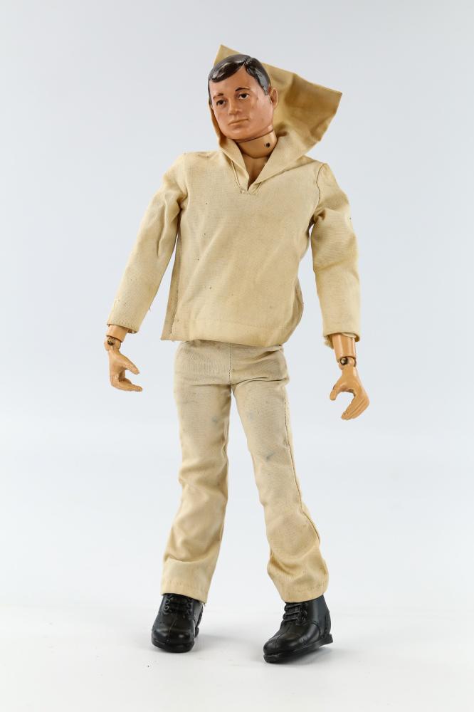 Original 1964 GI Joe 12" Action Figure: Original 1964 GI Joe 12" action figure by Hasbro. In overall poor condition with multiple fracture, dents, scrapes, etc. Foot is included, but stuck in boot. Please see photos for more detailed visual