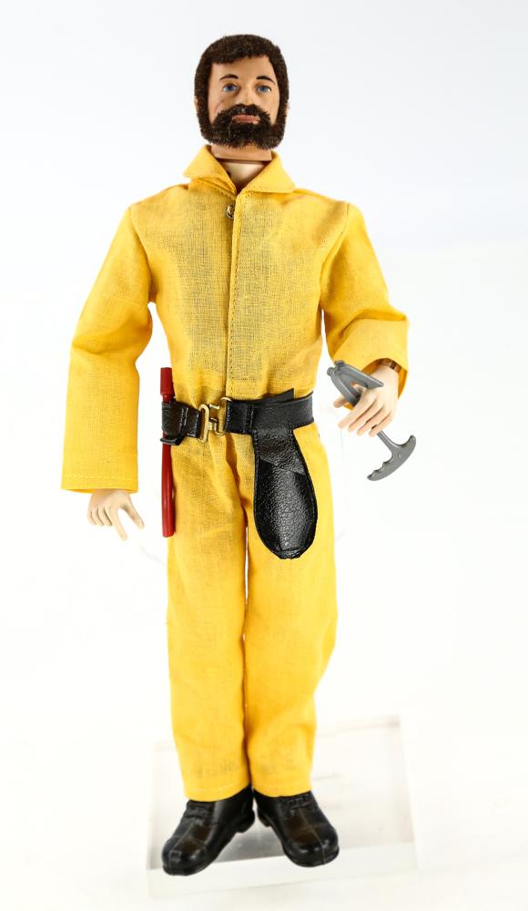 1970 Land Adventurer GI Joe 12" Action Figure: Original 1970 Land Adventurer GI Joe 12" action figure by Hasbro. Figure has stress fractures on the front of both knees, one forearm and one upper arm. One arm is covered in tape. Figure has some hai