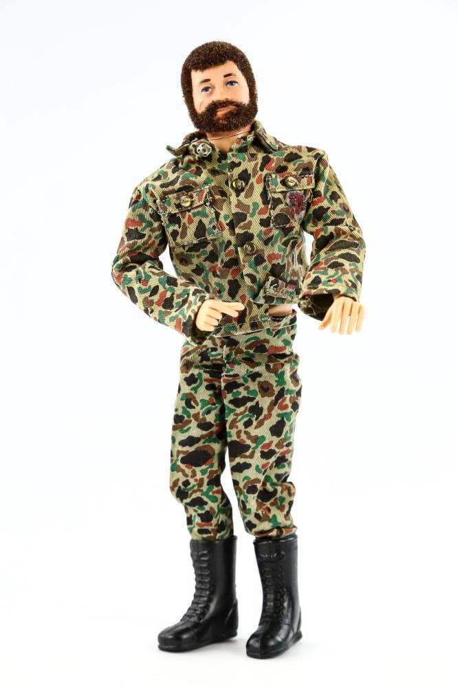 1970s Adventure Team GI Joe 12" Action Figure: GI Joe Adventure Team action figure from the 1970s by Hasbro. Doll has slight nicks on upper back. His foot is included but stuck in his boot. Hair has minimal bald spots. Has some paint loss to his e