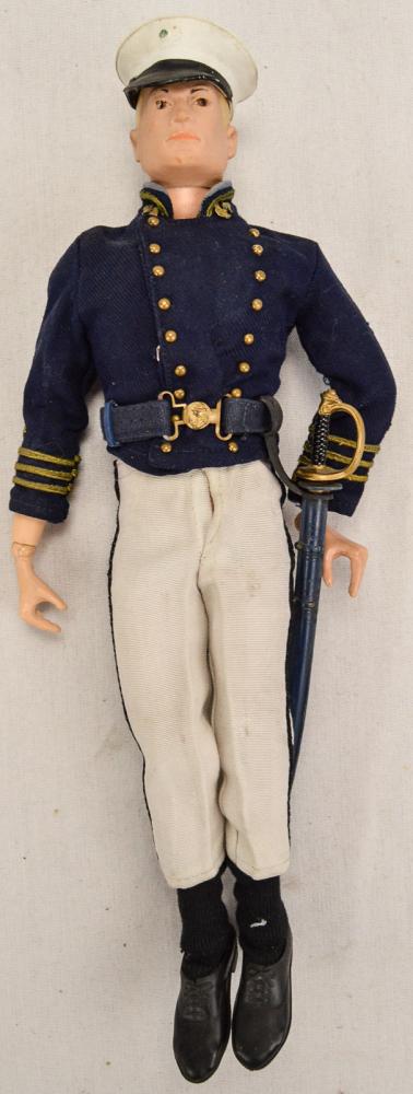 1966 Annapolis Cadet GI Joe 12" Action Figure: Original 1966 Annapolis Cadet GI Joe Action Figure by Hasbro. Doll has stress fractures on front of one knee, front of one ankle, on both thighs and large stress fracture on back. Figure has a possibl