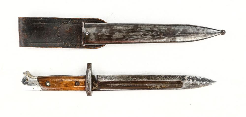 1899 Remington Fighting Knife Conversion: Made from 1899 Remington export bayonet. Fuller is stamped Remington Arms Company, Ilian, NY USA. It appears that the muzzle ring and hook removed, button filled in and pommel was nickeled. Scabbard i