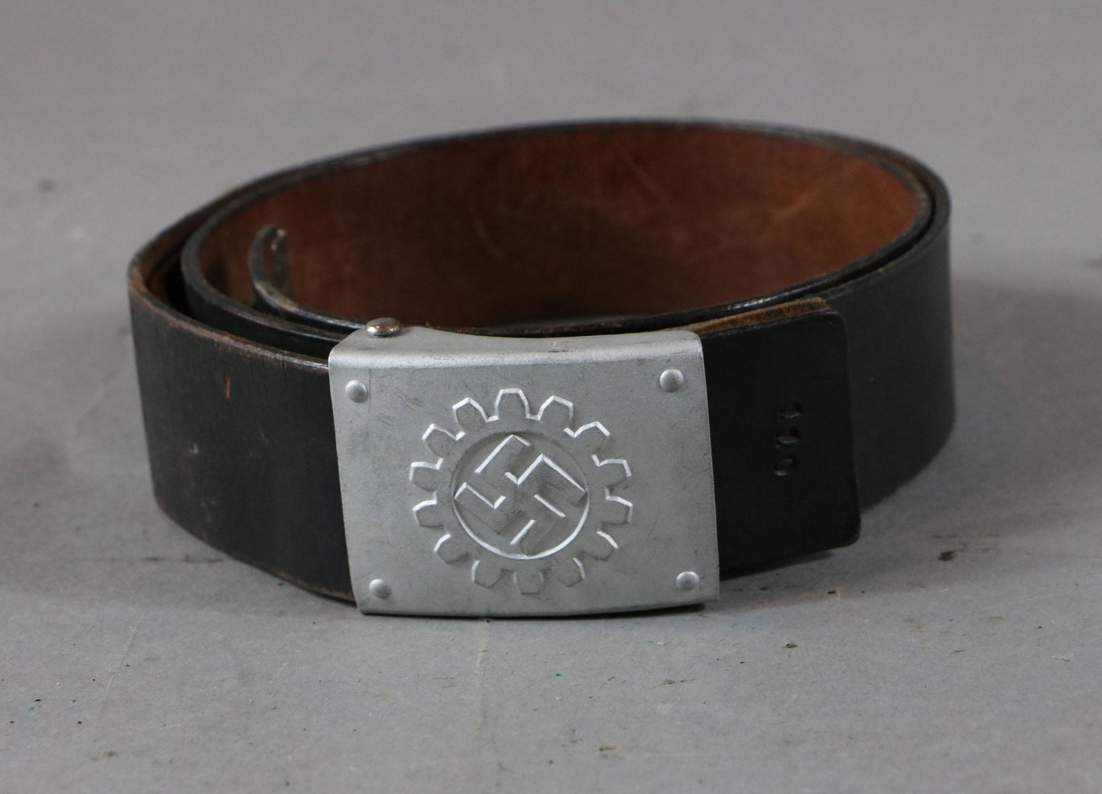 Nazi DAF Belt and Buckle: "DAF" German Labor. Marked RZM M4/39 'A'. Disclaimer: Due to the high quality of Nazi fakes, Donley Auctions has described this item to the best of their ability and assumes NO liability or responsibi