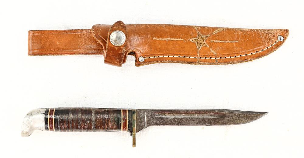 Small Utility Knife: Marked Western Boulder CO on blade. Very narrow blade with fuller. Frosted metal pommel. Worn leather washer handle. Leather sheath stylized with star on front and name on back. Working snap strap on 