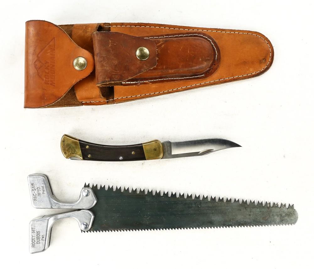 Rocky Mountain Folding Knife and Saw Combination: Saw with folding handle stamped PAC-SAW Wyo. and Rocky Mt DuBois on both sides. Saw is 10.5" with two different distinct saw teeth. The folding knife is stamped Buck 100 USA. Blade in beautiful sharpe