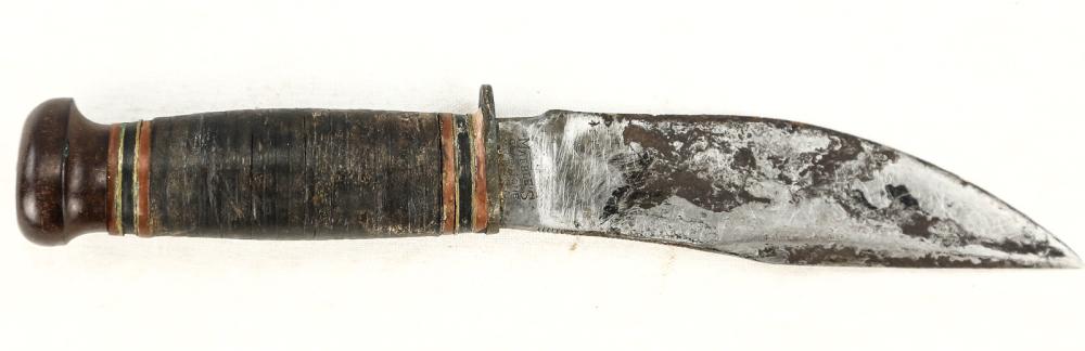 Marbles Fixed Blade Knife: Overall fair/poor condition. Leather grip. Phenolic pommel and ricasso. Blade in poor condition with heavy corrosion. Good tip. No sheath. Blade measures 4.375", overall measures 8.375". See photos.