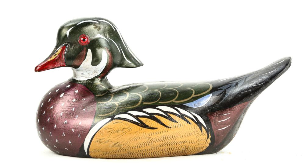 Wood Drake Duck Decoy: A solid body, wooden drake decoy by Charles Moore of Dekalb, IL. Flat bottom is signed "Chas. Moore, '96" in white handwriting. Decoy has glass eyes and is painted with great detail and realistic colo