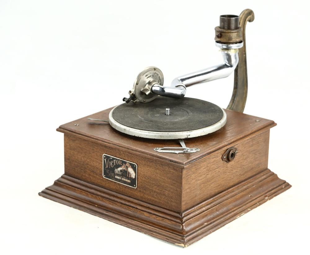European Decorator Phonograph: Decorator piece. No horn. No crank. Winds up and runs.