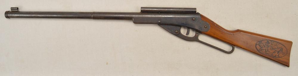 Daisy #195 Buzz Barton BB Rifle: Overall good condition. Wood stock. Peep sight intact.