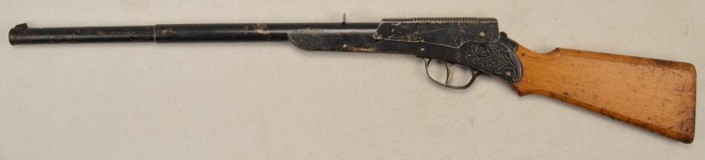Daisy #106 BB Rifle: Overall good condition. Gun cocks and fires. Measures 29.5" long.
