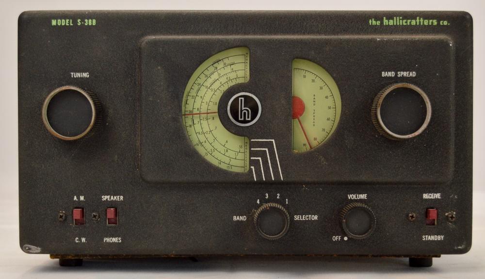 Hallicrafters Model S-38B Radio: A Model S-38B radio, made by the Hallicrafters Company. Radio has metal exterior with black wrinkle finish and is a superheterodyne receiver. Radio has a serial number of "AB-510692". Radio has some w