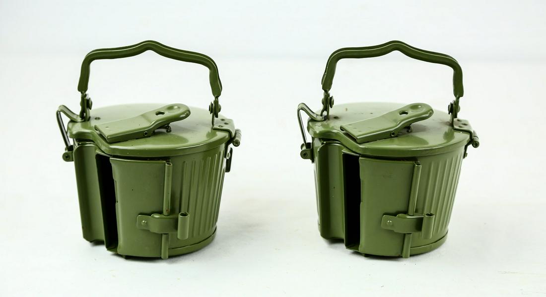 Lot of 2 Yugo MG34/MG42 Drums: Lot of 2 MG34 or MG 42 Yugo drums. Drums are painted in olive green. Some areas have rust from exposed metal with no paint. Great for re-enacting.