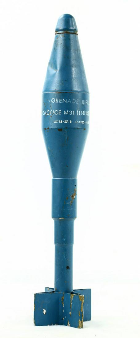 Korean War Era M31 Practice Rifle Grenade: M31 training rifle grenade made in the 1950's-60's to be used on the M1 Garand, M14, and M16 rifles. Round has a dent at the top and the fins have some worn paint. Overall good condition. See photos.