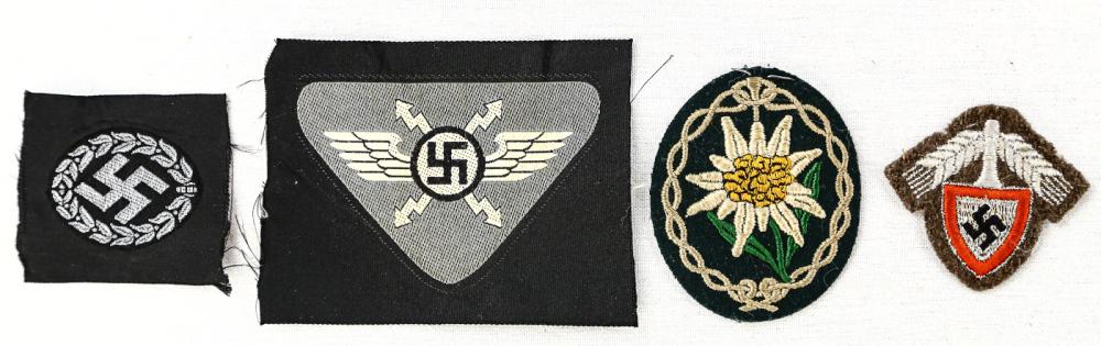 Lot of 4 WWII German Patches: Lot includes 4 patches with three bearing the Nazi swastika. Last patch is a German Edelweiss patch, commonly associated and used by German mountain troops of the elite 1st Mountain Division. Patches