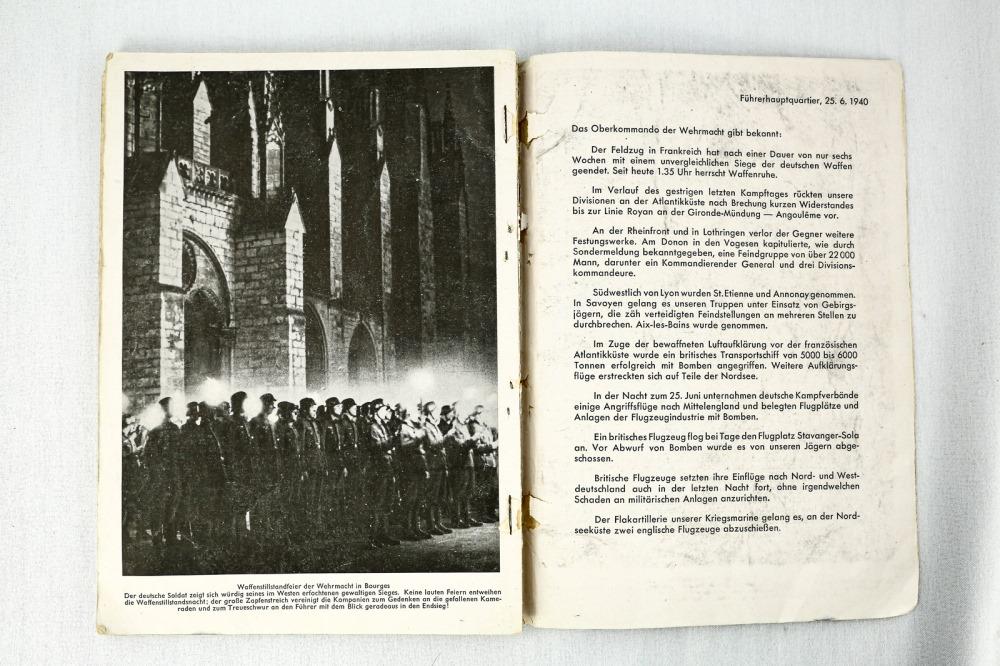 WWII German "Der Grosse Befehl" Picture Book: A 1941 dated picture book titled "Der Grosse Befehl- Der Sieg Im Westen In 100 Bilddokumenten" featuring numerous images of German soldiers in the various Western Front campaigns that Germany had unde