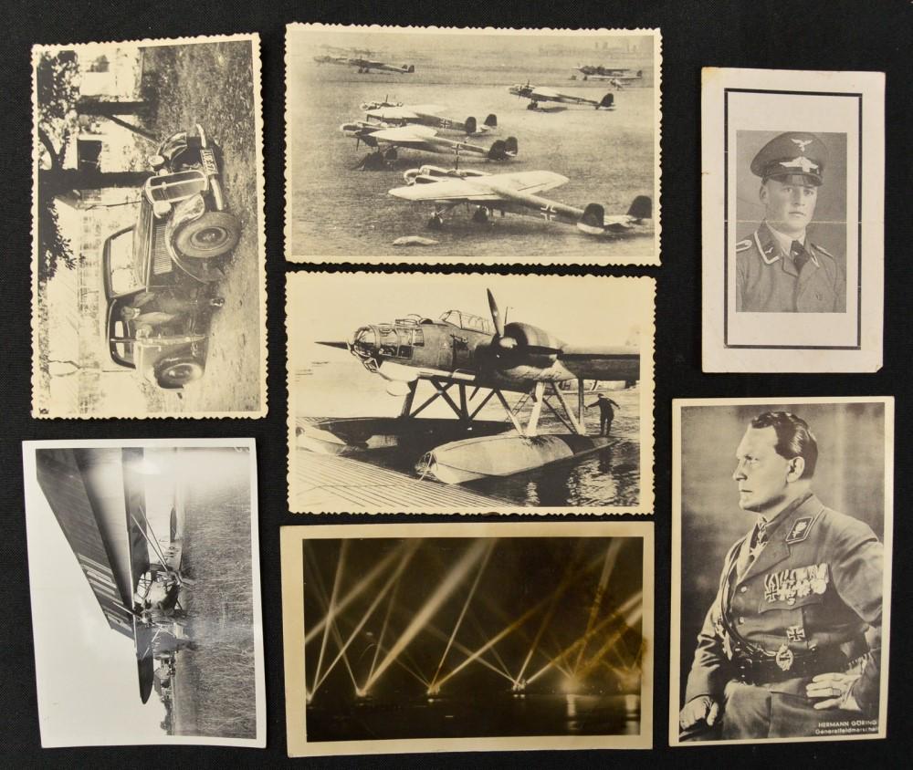 Lot of 7 WWII German Postcards: Lot of 7 WWII German postcards depicting planes, ships, man in a car, Luftwaffe crew member, and Hermann Goring. 4 postcards have pencil markings on the back and another has a handwritten message. Pho