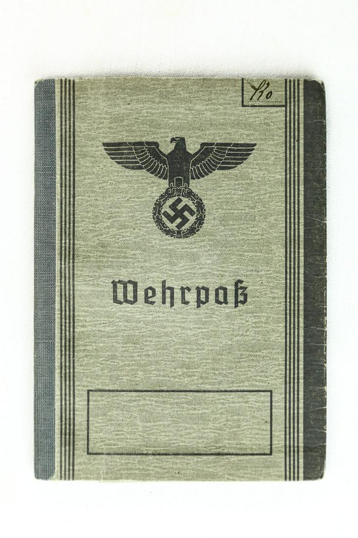 WWII German Wehrpass: Wehrpass issued by the navy to "Jo Honnes Koch", 3, Nov, 1943. Includes photo of the sailor. Overall very good condition. See photos. Due to the high quality of German fakes, Donley Auctions has descr