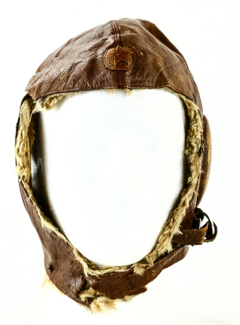 WWII Japanese Pilot's Cap: WWII Japanese fur pilot's cap. Cap is missing a strap on one side and has a few tears. Overall fair condition. See photos.