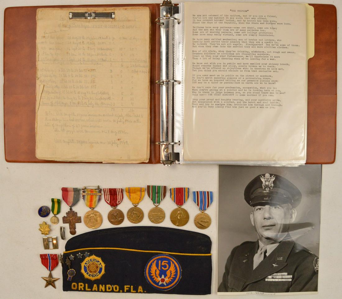 WWII USAAF Photo and Record Lot: Lot of United States Army Air Force items that include photos of pilots and other crewmen, medals, an American Legion cap, and a large book of records from the 1940s that include service records of pi