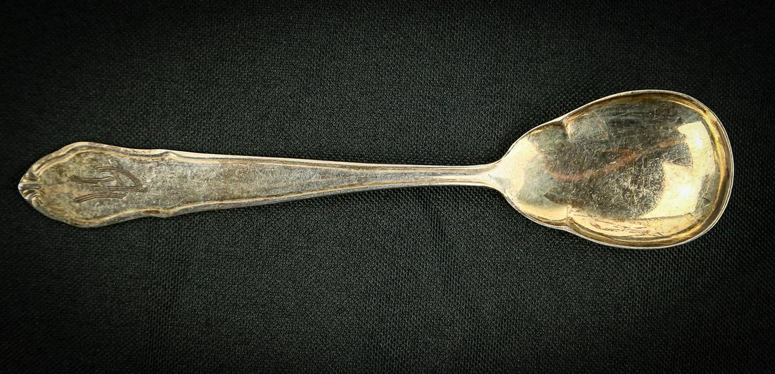 WWII Nazi Adolf Hitler Silverware Spoon: Adolf Hitler Spoon. This spoon was part of Hitler's formal dining ware and used by him at his various places of residence. This spoon has the curved, interlocked AH monogram deeply etched in the spoon