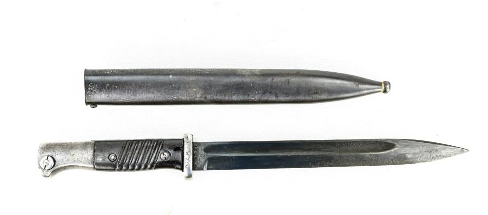German 98K Bayonet: Blade and scabbard stamped fze 43. Serial numbers on blade and cross guard do not match scabbard's. Grips very nice with flash guard, but no inspection mark on pommel. Blade appears to re-arsenal blue