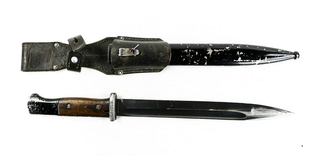 Rare WWII German "Ostsee" K98k Bayonet: Bayonet has nice blued blade with slightly blunted tip. Bluing has some wear from being in and out of the scabbard. Ricasso is marked "W.K.C." on one side and numbered "6707j" on the other. Spine of b