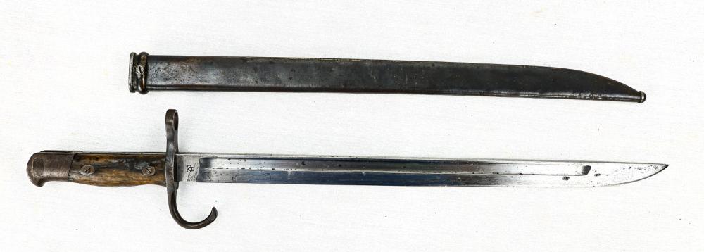 Japanese Type 30 Bayonet: Production started in 1897 and continued throughout the war. Early Production Tokyo arsenal with hooked guard. Bright 15.5" blade. Wooden grips and scabbard show wear. Small Kanji character stamped in