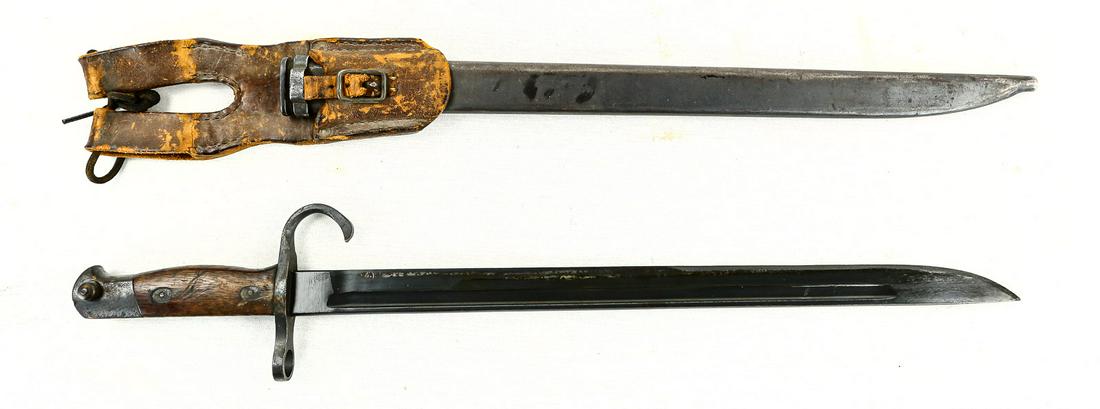 WWII Japanese Type 30 Bayonet: Bayonet has blued blade with slightly blunted tip. Blade has some bluing wear from being in and out of the scabbard as well as some minor nicks in the edge. Ricasso is marked with the maker's mark of 