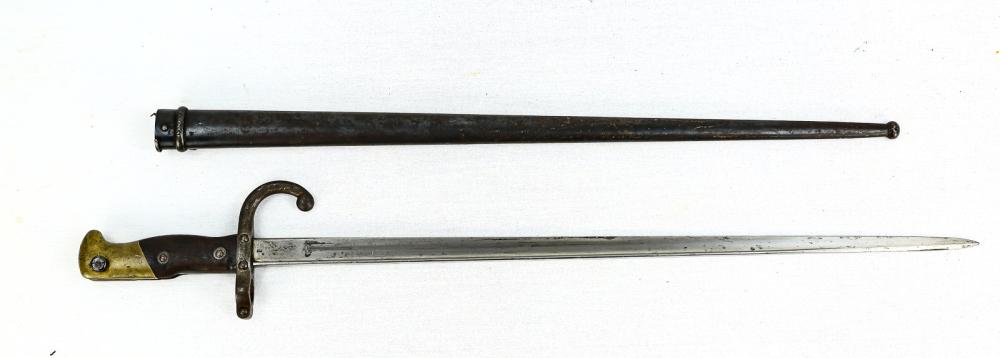 French 1870 Gras Bayonet: Hard to find, manufactured in Tulli 1880, non matching scabbard, overall very good condition. Measures 20.5" blade.