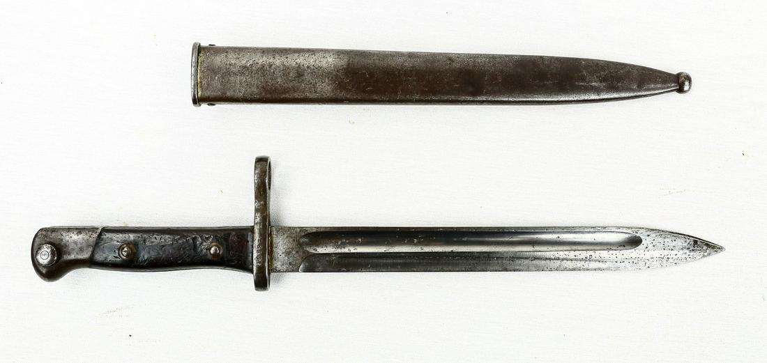 M1895 Chilean Mauser Bayonet: Bayonet has a slightly blunted tip with the blade being lightly pitted and oxidized throughout. Ricasso is marked "Weyersberg, Kirschbaum & Co., Solingen". Blade has some faint remains of cosmoline an