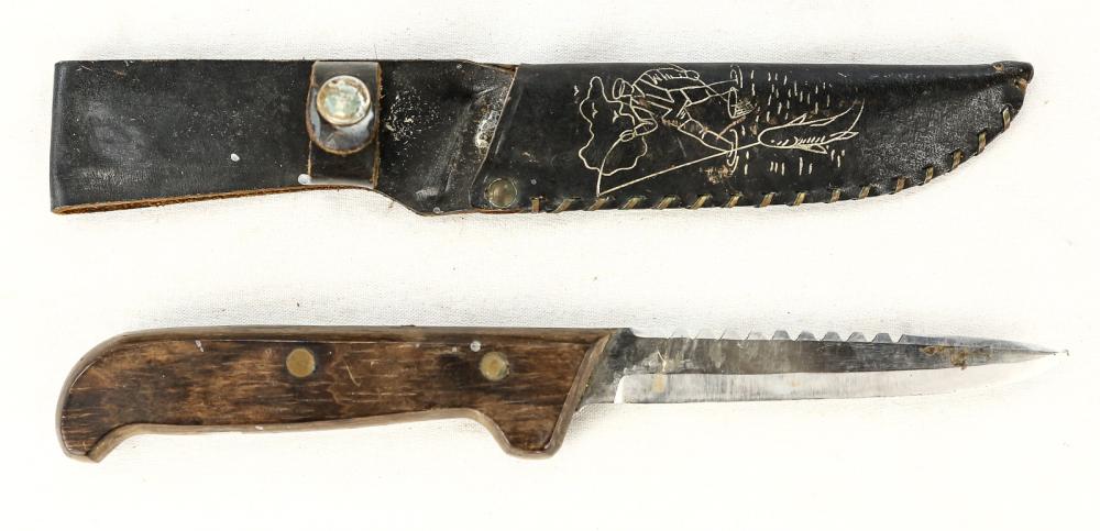 Fishing Knife: Name etched on blade is Frost Sweden Stainless. Pronounced serration on top of blade. Wood grip in average condition with 2 brass rivets. Black leather sheath exhibits fisherman catching fish. Blade m