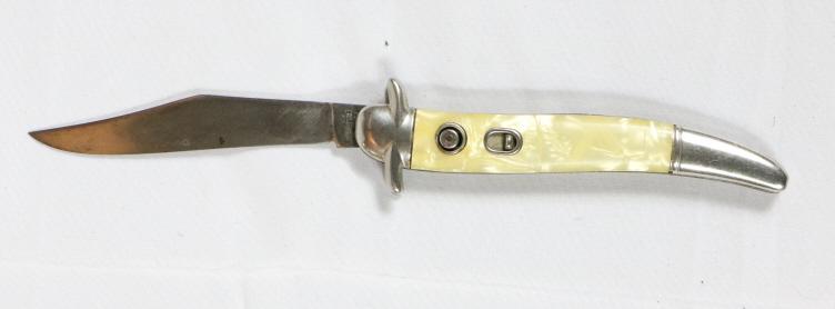 Imperial Knife Co. Side Opening Knife: Type: Side opening. Country: United States. Manufacturer: Imperial Knife Co. Release: Push button. Length: 7 1/2". Scales: Imitation white pearl. Bolsters: Nickel. Liner: Steel. Condition: Good. Tang 