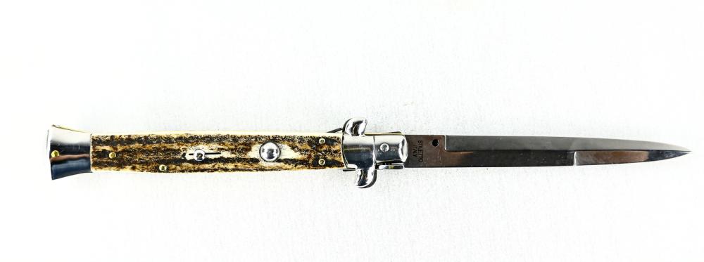 11” Italian Side Opening Switchblade: 11 inch Italian side opening switchblade. Bayonet style blade. Stiletto Italy tang stamp. Genuine stag handles. Renzo Beltrame maker. New. See photos.