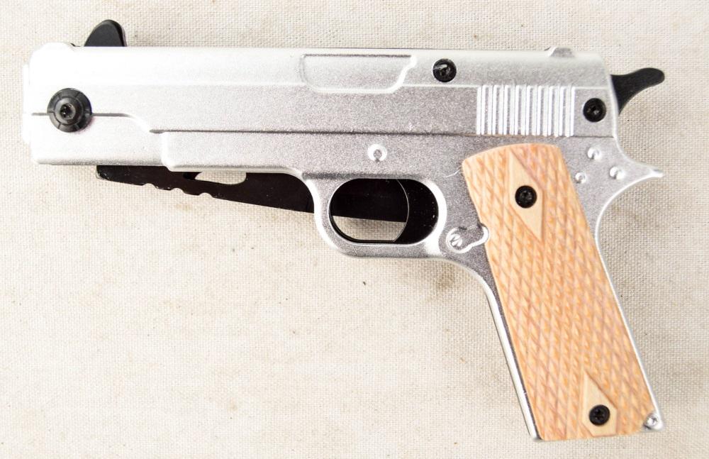 Assisted Opening Gun Knife: Gun Knife assisted Opening with liner lock. Imported. New in box. See photos.