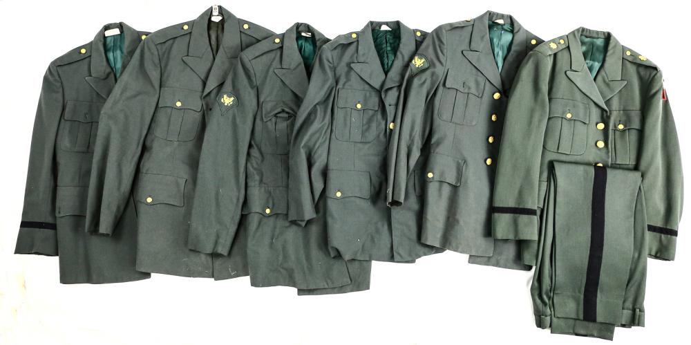 6 Vietnam U.S. Army Dress Jackets & 1 Trouser: Army green in color. L&R upper sleeve is rank of Specialist, size 37R, R sleeve rank of Specialist, L sleeve patch unknown, size 39L Sleeves unmarked: 39S, 40L, Officers gold oak leaf insignia on shou