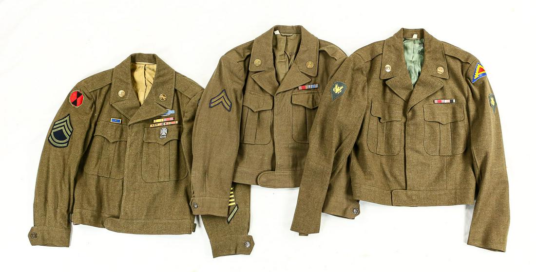 Lot of 3 Post WWII US Ike Jackets: Lot contains 3 US Ike jackets from post-WWII, with all three having unit patches and 2 having rank patches on sleeves. The technical sergeant's uniform has the Combat Infantry Badge above the left bre