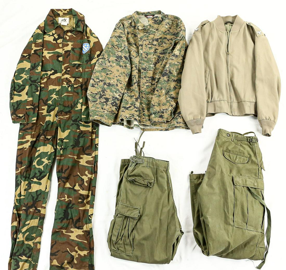 Lot of Misc. US Uniforms: Lot contains a pair of M1951 field trousers, another pair of trousers, a light jacket, a MARPAT jacket, and a camouflaged flight suit made by American Stream. MARPAT jacket is size X-Large regular, fl