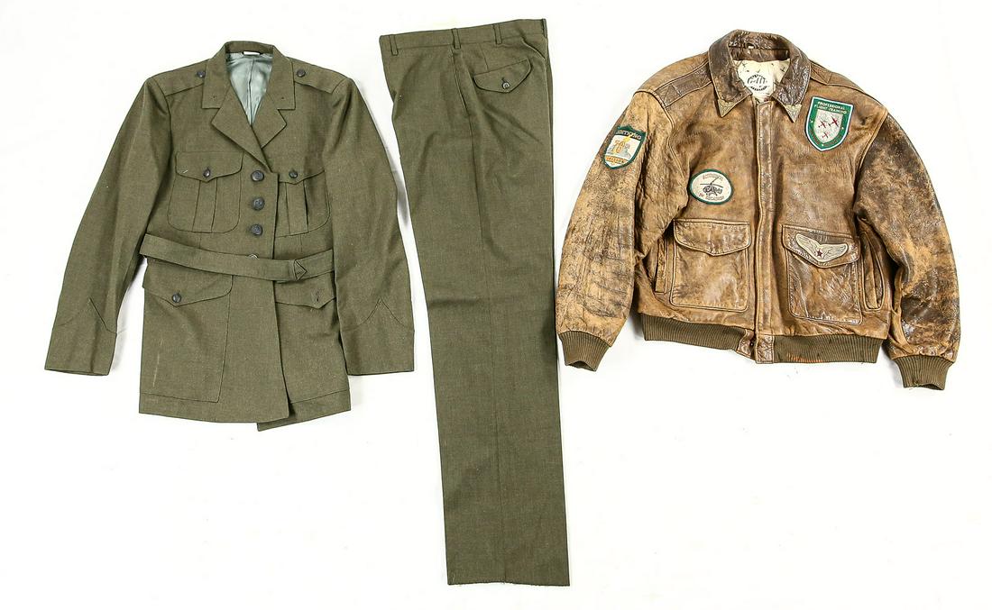 US Repro Bomber Jacket & Dress Uniform: Lot consists of a repro bomber jacket and a dress uniform. Bomber jacket has worn leather and has had four patches sewn on consisting of a patch for the "Lightning 78th Division", a "Profession Flight