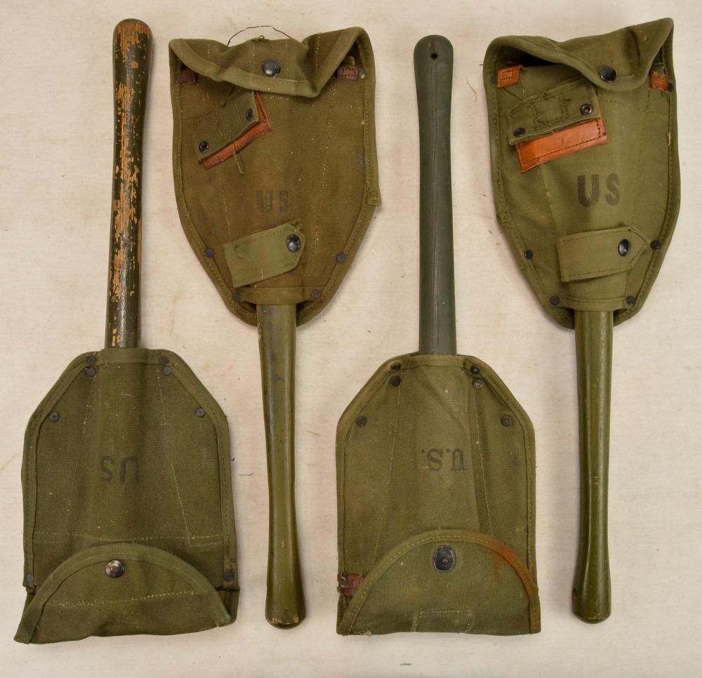 US Army Entrenching Shovels: Includes: US Army folding entrenching tools w canvas cover: Vietnam dated 1964; qty 2 WWII dated 1943, 1 w stain; Korean War, dated 1952. See photos.