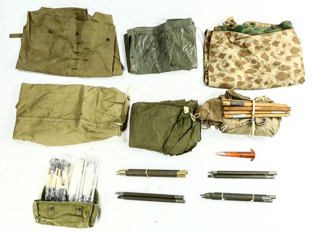 US Military Shelter Halves & Poncho Lot: WWII to 1960s shelter halves and ponchos with pegs and poles. See photos for condition.