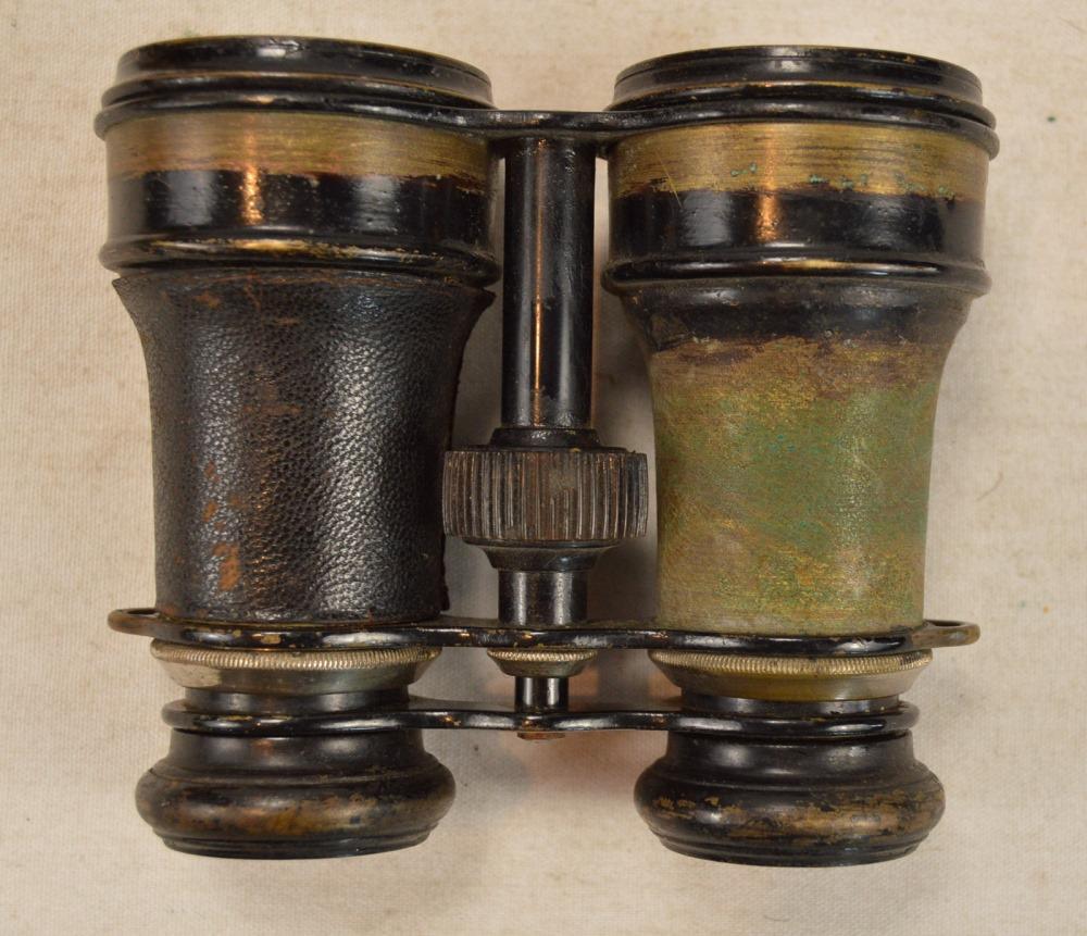 French WWI/WWII Era Binoculars: Interesting antique design with compass built into front bridge between lenses. Fair condition for age. Neat collector item.