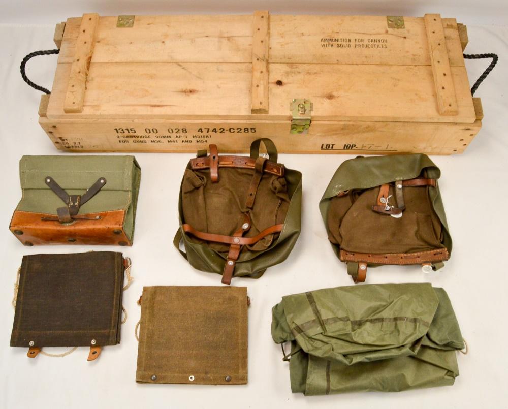 Lot of Foreign Field Gear: Lot contains a pair of Swedish map cases as well as a Swiss bread bag and ammo bag dating to around WWII. Lot also contains a pair of olive drab duffel bags. Lot comes in a US ammo crate for 90mm shel
