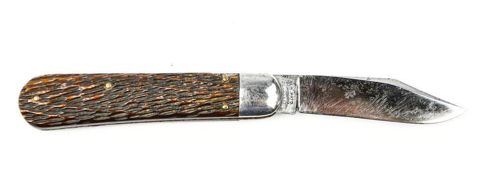 Schrade Side Opening Knife: Type: Side opening. Country: United States. Manufacturer: Schrade Knife Co. Release: Push button. Length: 7 1/4". Scales: Picked bone brown. Bolsters: Nickel. Liner: Steel. Condition: Very good. Tang 