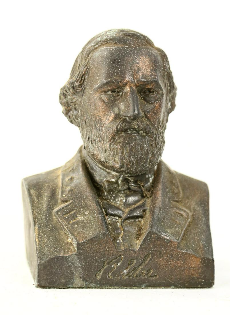 Robert E Lee Metal Bust: Small metal bust of the Civil War Confederate General Robert E Lee. Bust has some corrosion here and there but is still in good condition. Bust has felt on the bottom and a copy of his signature is en