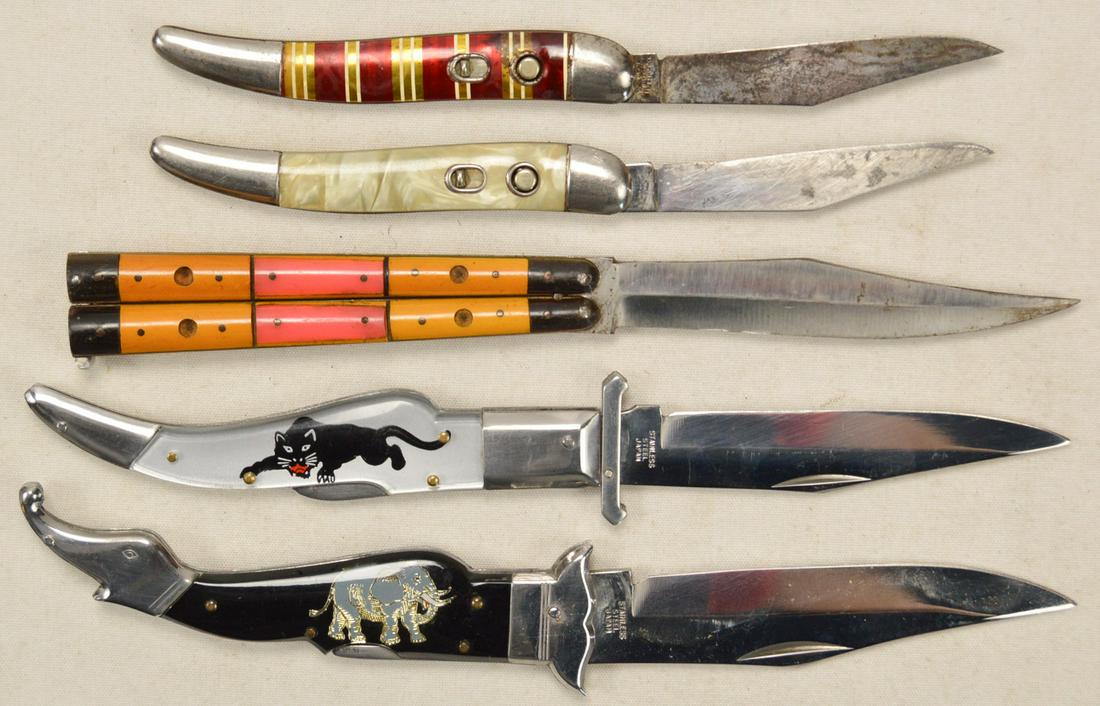 Lot of 5 Pocket Knives: Lot of 5 pocket knives. Lot includes 2 switchblades by Hammer US, 2 folding knives made in Japan, and a butterfly knife with an unknown maker. Butterfly knife has two broken bolsters but can still be 
