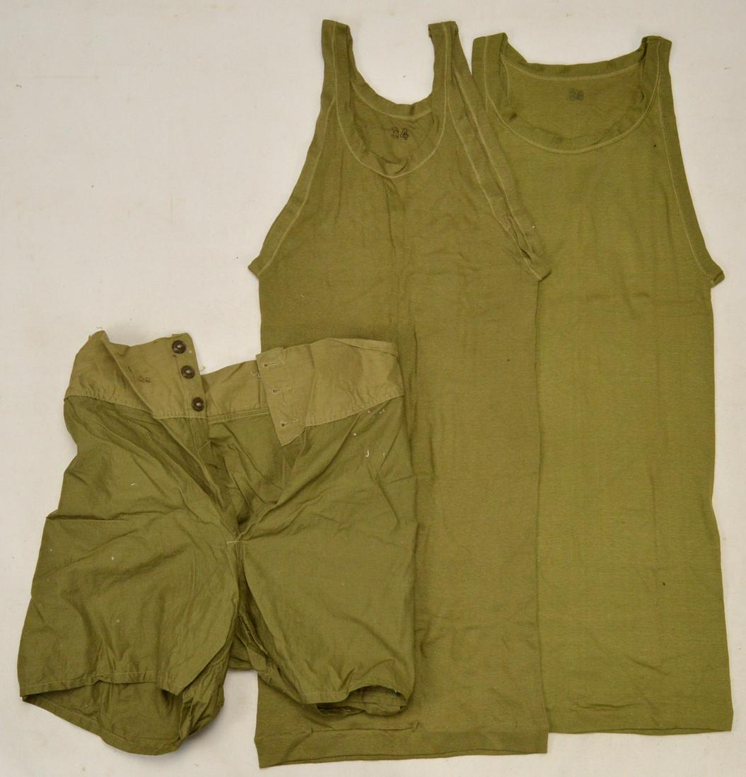 Lot of WWII US Undergarments: Lot of WWII US undergarments. Lot includes 2 sleeveless shirts and a pair of underwear. Shirts are size 34 and 36. All are in good used condition. See photos.